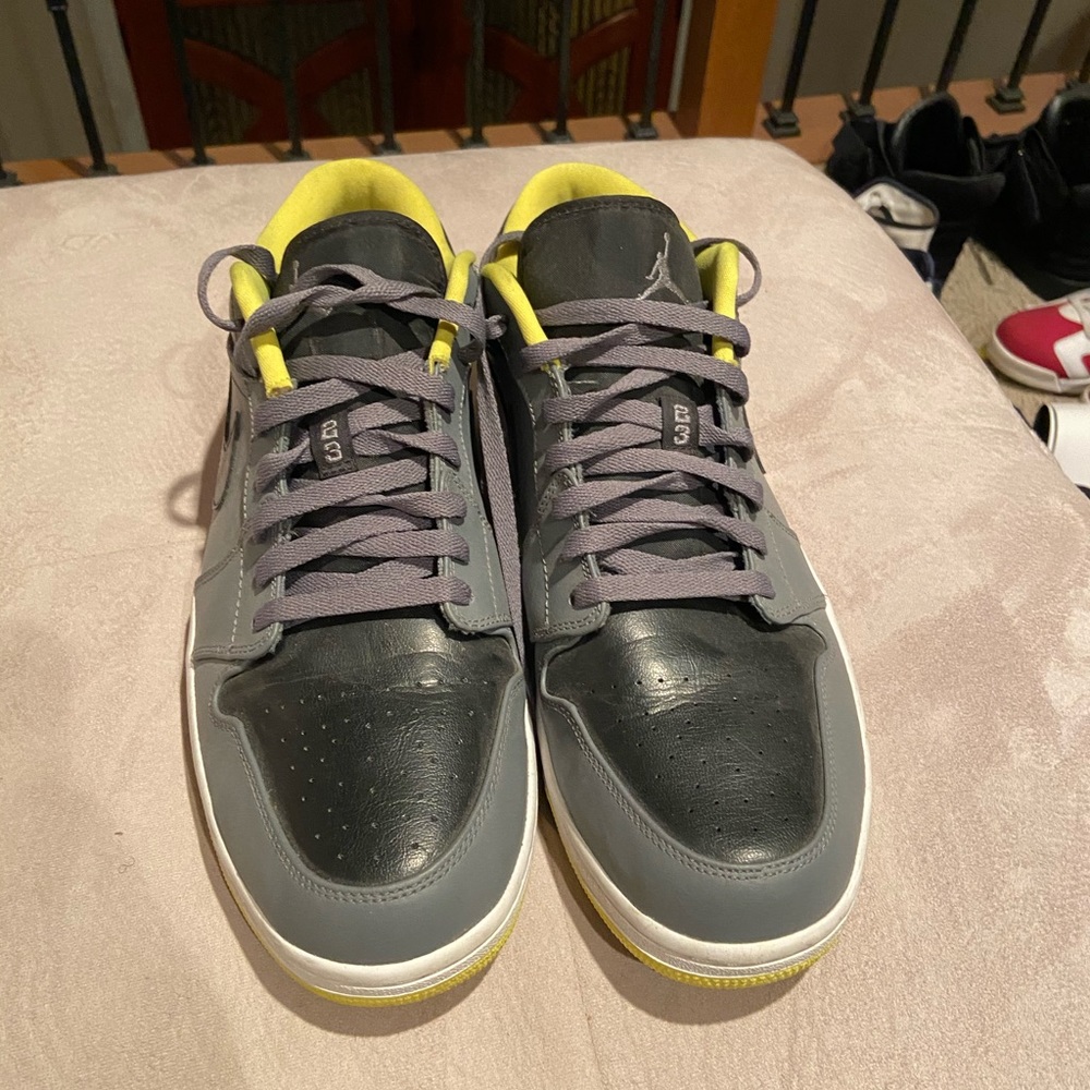 Low top retro Jordan 1s.
